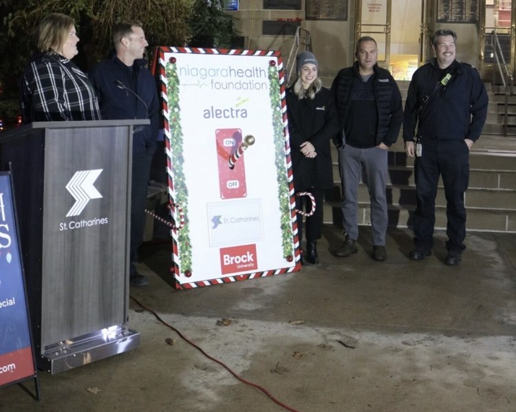 Speakers and Alectra staff beside the Niagara Health Foundation switch at the Celebration of Lights ceremony outside St. Catharines City Hall
