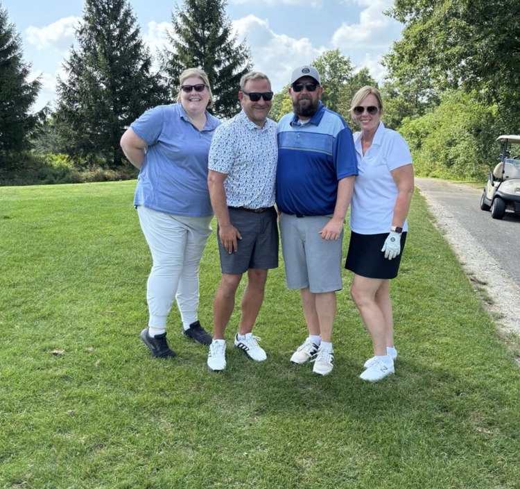 Matt Harris with his foursome at the Peart Family golf tournament